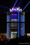 IAA 2021 - BMW Group - Lichtinszenierung  projiziert auf die BMW Zentrale – den Vierzylinder